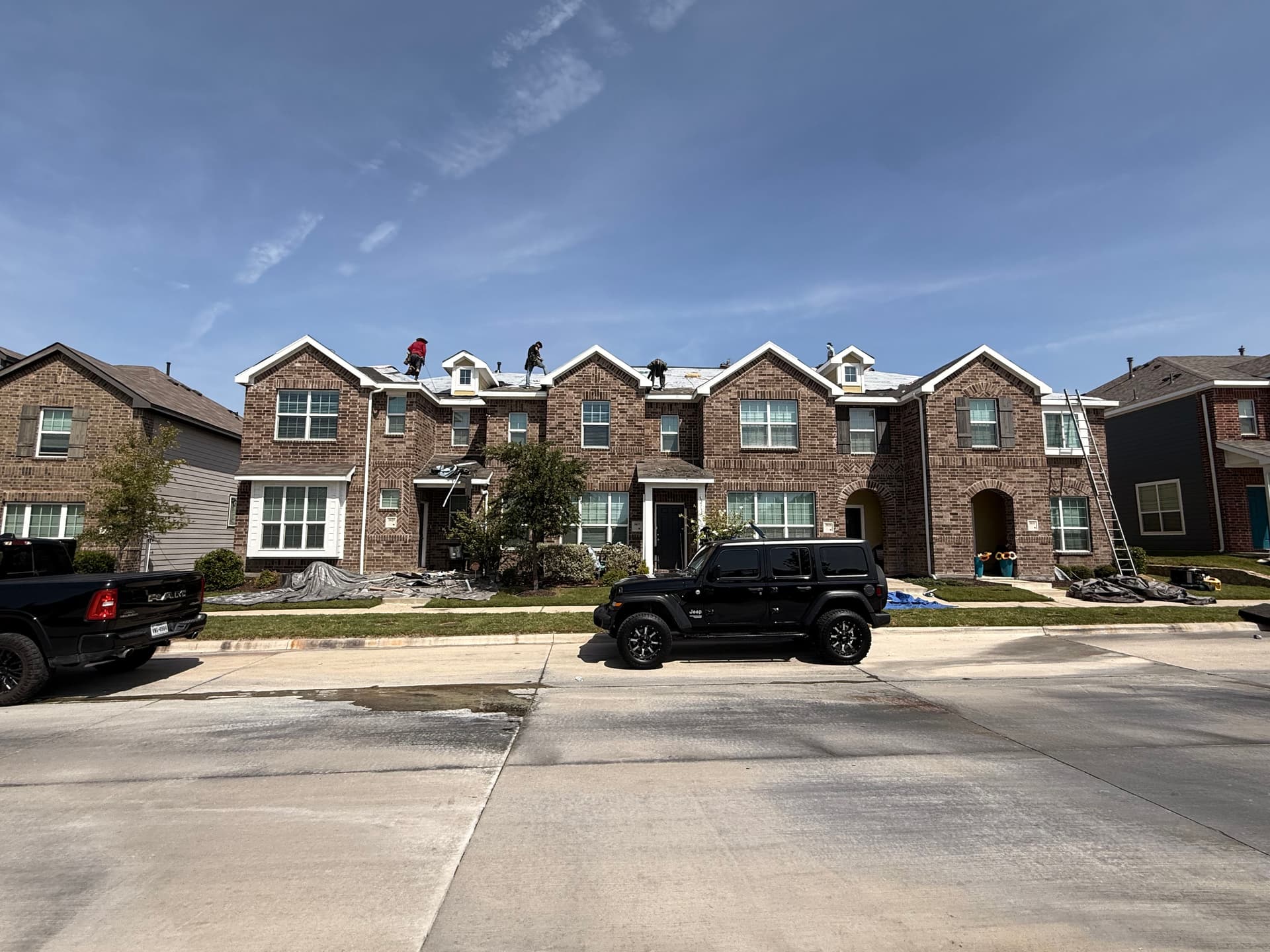 Gallery photos for Reroofing 24 Townhome Buildings the Right Way: Image #1
