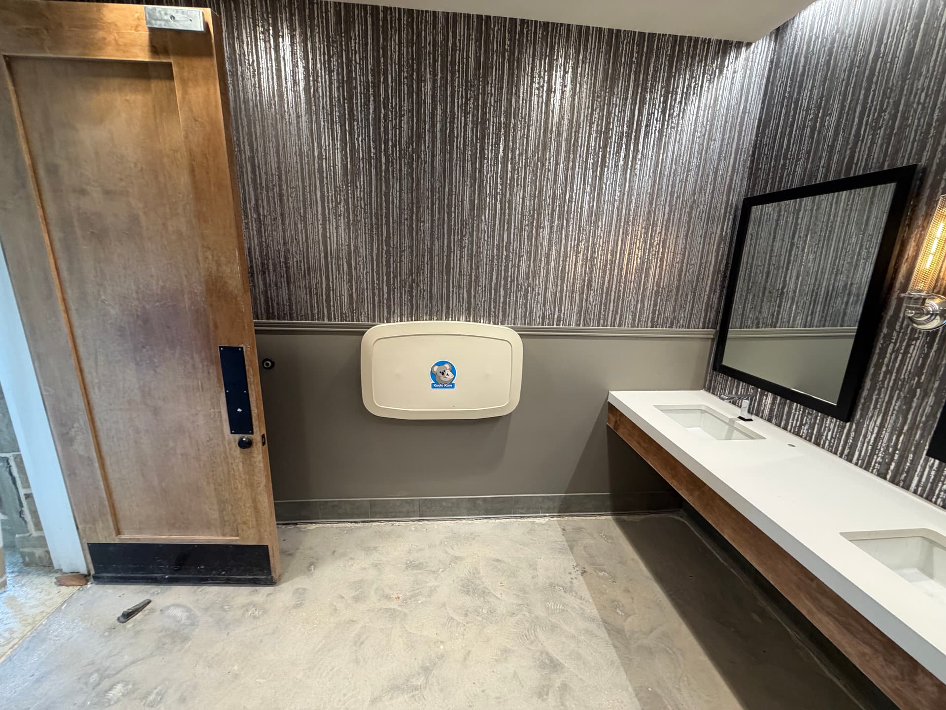 Gallery photos for HOA Poolside Bathroom Painting and Wallpaper in Wylie: Image #1